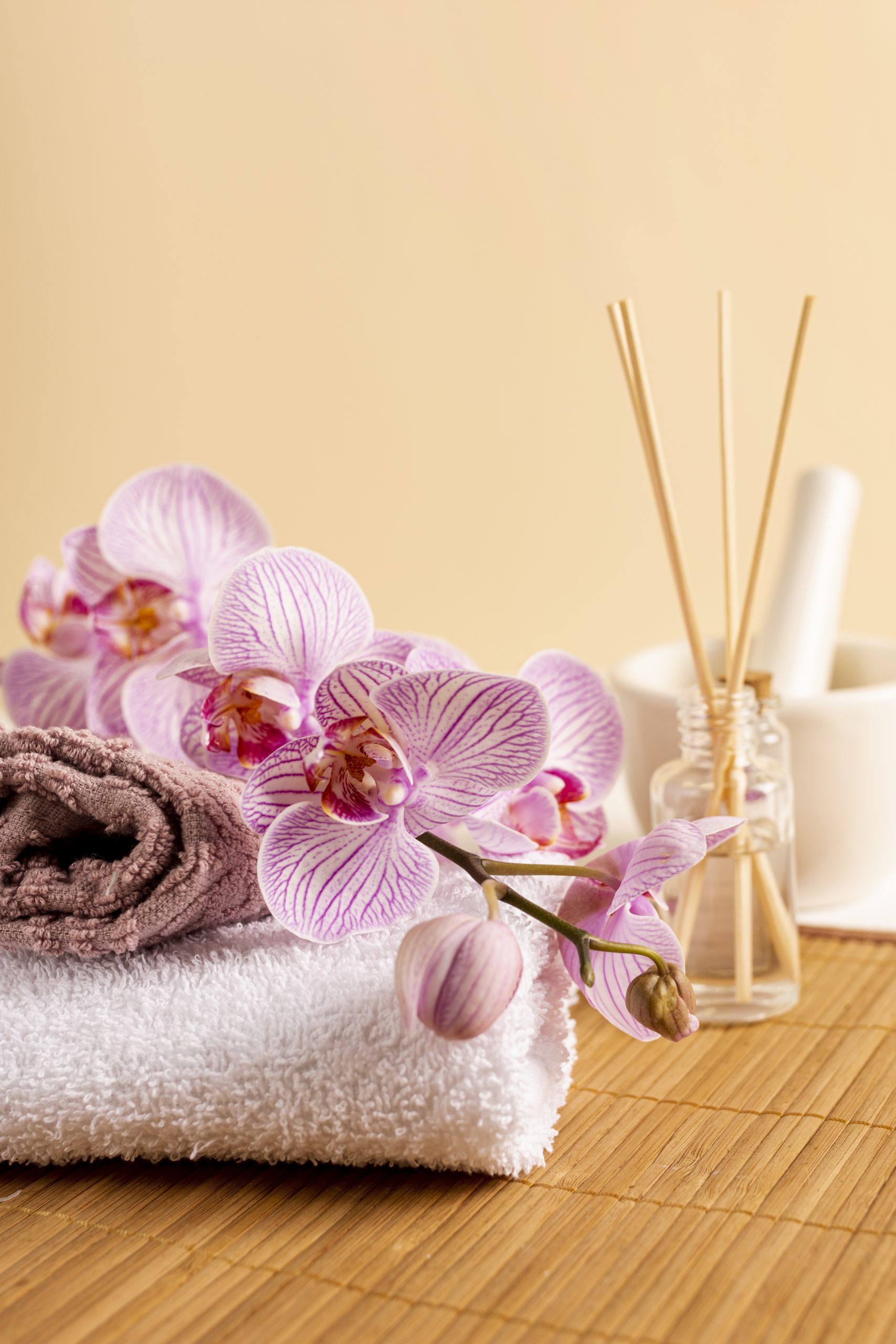 spa-decoration-with-scented-sticks-flowers